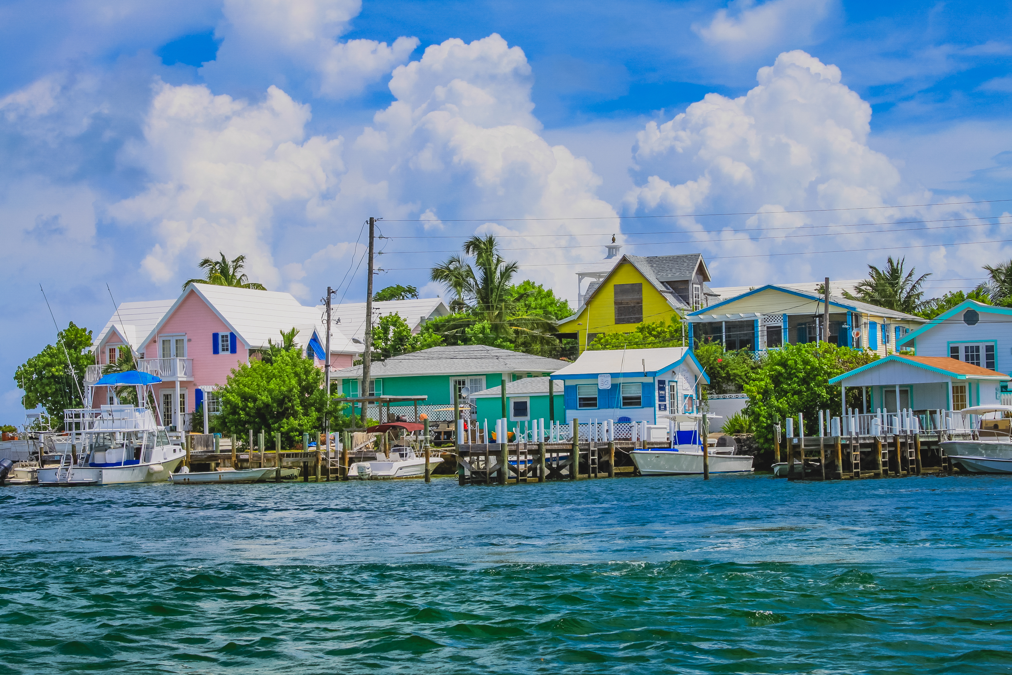  Brighly colored coastal houses on Elbow Cay, Bahamas